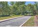 Bocce ball court featuring a gravel playing surface, a canopy, and a bench at 128 Championship Dr, Mooresville, NC 28115