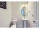 Clean powder room with pedestal sink and wood-look floors at 128 Championship Dr, Mooresville, NC 28115