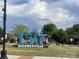 Mooresville town sign with community details set within a beautifully landscaped area at 128 Championship Dr, Mooresville, NC 28115