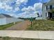 Walking trail for pedestrian traffic only, bordered by well-maintained landscaping at 128 Championship Dr, Mooresville, NC 28115