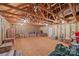 An unfinished basement space with exposed wood beams and insulation; perfect for future customization at 130 Churchill Dr, Salisbury, NC 28144