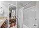 This bathroom features a vanity with granite countertops and a shower and tub combination at 130 Churchill Dr, Salisbury, NC 28144