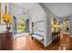 Elegant foyer with a chandelier, arched doorway, hardwood floors, and a view of the outside at 130 Churchill Dr, Salisbury, NC 28144
