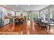 Spacious kitchen featuring an island, breakfast bar, and dining area with plenty of natural light at 130 Churchill Dr, Salisbury, NC 28144