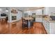 Well-equipped kitchen with white cabinets, granite countertops, stainless steel appliances, and a center island at 130 Churchill Dr, Salisbury, NC 28144