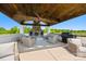 Outdoor cabana featuring a stone fireplace, wood ceiling and grill, perfect for entertaining at 1351 Highway 324 None, Rock Hill, SC 29730