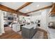 Spacious kitchen with stone countertops, modern appliances, and views into the living area with fireplace at 1351 Highway 324 None, Rock Hill, SC 29730