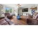 Comfortable living room features leather seating, a ceiling fan, and plenty of space to relax at 1351 Highway 324 None, Rock Hill, SC 29730