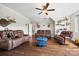Spacious living room featuring hardwood floors, leather furniture, and unique hunting decor at 1351 Highway 324 None, Rock Hill, SC 29730