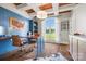 Bright home office with custom built-ins, wood ceiling, large window, and stylish furnishings at 1351 Highway 324 None, Rock Hill, SC 29730