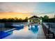 Sparkling pool and spa area with outdoor kitchen and fireplace, perfect for entertaining or relaxing at 1351 Highway 324 None, Rock Hill, SC 29730