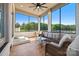 Relaxing screened porch with comfortable seating and clear view of the trees at 1351 Highway 324 None, Rock Hill, SC 29730
