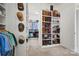 A well-organized walk-in closet showcases ample shelving and storage for clothing and shoes at 1351 Highway 324 None, Rock Hill, SC 29730