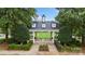 Beautiful community gazebo with picnic tables offers a relaxing space surrounded by greenery at 13714 Jacks Ln, Pineville, NC 28134