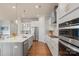 Bright kitchen with stainless steel appliances, granite countertops, and hardwood floors at 13714 Jacks Ln, Pineville, NC 28134