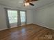 Spacious bedroom with laminate floors and windows at 1495 Carson Rd, Cleveland, NC 27013