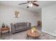 Inviting living room featuring modern furnishings and a decorative area rug at 1512 Seigle Ave # 2, Charlotte, NC 28205