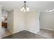 Bright dining room featuring neutral decor and easy access to other rooms of the home at 1525 Moss Creek Dr, Harrisburg, NC 28075