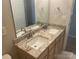 Bathroom vanity with double sinks and granite countertops at 16017 Woodcote Dr, Huntersville, NC 28078