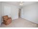 Bedroom with carpet, ceiling fan and doorway at 16017 Woodcote Dr, Huntersville, NC 28078