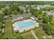 Community pool and recreation area with ample seating for residents at 16610 Amberside E Rd, Cornelius, NC 28031