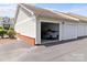 Open garage featuring extra storage in a desirable neighborhood at 16610 Amberside E Rd, Cornelius, NC 28031