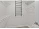Walk-in closet featuring white wire shelving and a full length hanging rack at 16610 Amberside E Rd, Cornelius, NC 28031