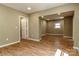 Spacious living room featuring wood floors, fresh paint, and ample natural light at 209 W Marsh St, Salisbury, NC 28144