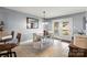 Bright dining room with tile flooring and a view to the backyard at 2315 Perry Rd, Denver, NC 28037