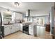 Stylish kitchen with stainless steel appliances, sleek countertops, and a convenient island at 2315 Perry Rd, Denver, NC 28037