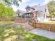 Spacious backyard features a large wooden deck and gated area, great for entertaining at 232 W Wilson Ave, Mooresville, NC 28115