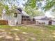 Spacious backyard features a large wooden deck and well-maintained lawn at 232 W Wilson Ave, Mooresville, NC 28115
