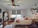 Bedroom with a ceiling fan, posters, area rug, and a full bed at 232 W Wilson Ave, Mooresville, NC 28115