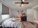 Bedroom featuring a bed, hardwood floors, fan, and natural light from the windows at 232 W Wilson Ave, Mooresville, NC 28115