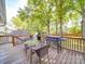 Outdoor deck with dining table, grill and blackstone griddle, perfect for outdoor entertaining at 232 W Wilson Ave, Mooresville, NC 28115