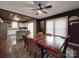Elegant dining room featuring a large wooden table and seamless flow to kitchen at 232 W Wilson Ave, Mooresville, NC 28115