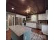Spacious kitchen with stainless steel appliances, white cabinets, and granite countertops at 232 W Wilson Ave, Mooresville, NC 28115