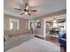 Spacious living room with hardwood floors seamlessly connecting to kitchen and dining areas at 232 W Wilson Ave, Mooresville, NC 28115