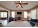 Bright living room with hardwood floors, fireplace, and comfortable seating arrangement at 232 W Wilson Ave, Mooresville, NC 28115