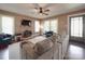Cozy living room featuring a fireplace, comfortable seating, and natural light at 232 W Wilson Ave, Mooresville, NC 28115