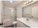Bathroom featuring a shower-tub combination and a white vanity with a large mirror at 2424 Pitts Dr, Charlotte, NC 28216