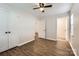 Spacious bedroom featuring wood-look floors and ample closet space at 2424 Pitts Dr, Charlotte, NC 28216
