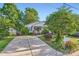 Charming house with a lush lawn, driveway, and mailbox at 2424 Pitts Dr, Charlotte, NC 28216