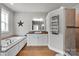 Bright bathroom features a soaking tub, walk-in shower, and stylish white vanity with beautiful wood floors at 2853 Mathis Church Rd, Catawba, NC 28609