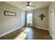 Bright bedroom with wood floors has a nice big window, neutral walls and lovely trim at 2853 Mathis Church Rd, Catawba, NC 28609