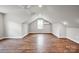 An expansive bonus room with hardwood floors and a large window, making this a great flex space at 2853 Mathis Church Rd, Catawba, NC 28609