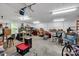 A cluttered garage presents ample space for projects and storage and features lots of lighting at 2853 Mathis Church Rd, Catawba, NC 28609