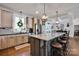 Spacious kitchen features an eat-in island, modern lighting, and stainless appliances at 2853 Mathis Church Rd, Catawba, NC 28609