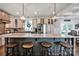 Bright kitchen featuring an oversized island, stainless appliances, and stylish pendant lighting at 2853 Mathis Church Rd, Catawba, NC 28609