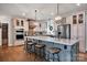 Gourmet kitchen with stainless steel appliances, large island, and pendant lighting at 2853 Mathis Church Rd, Catawba, NC 28609